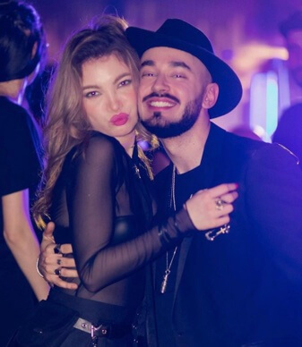 Victor Dorobantu with his girlfriend.